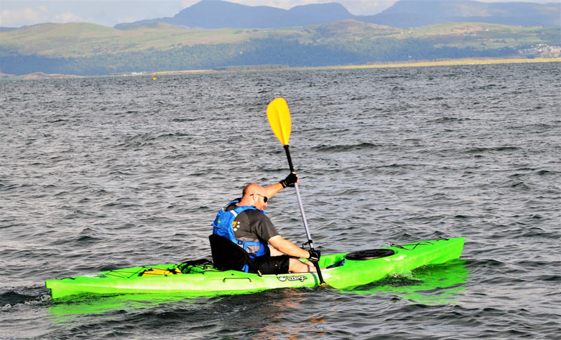 Tom enjoying his maiden kayak ‘sea trials’ voyage near head office off the Snowdonia coast